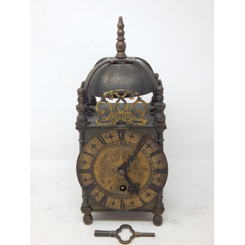 602 - Brass Lantern Clock by Empire, Complete with Key: Measuring 25cm high