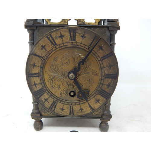 602 - Brass Lantern Clock by Empire, Complete with Key: Measuring 25cm high