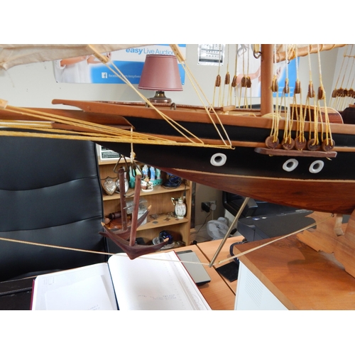 598 - Large Wooden Model of a Three Masted Schooner on Stand: Reputably from Admiralty House. Measuring 14... 