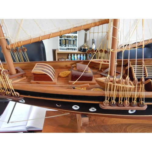 598 - Large Wooden Model of a Three Masted Schooner on Stand: Reputably from Admiralty House. Measuring 14... 