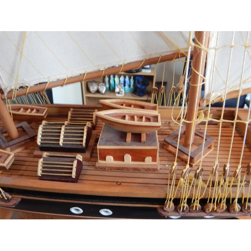 598 - Large Wooden Model of a Three Masted Schooner on Stand: Reputably from Admiralty House. Measuring 14... 