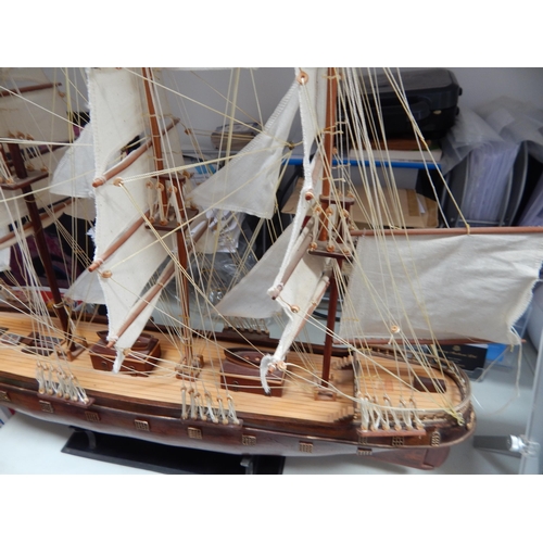 599 - Wooden Model of a Three Masted Galleon: Reputably from Admiralty House. Measuring 95cm wide x 66cm h... 