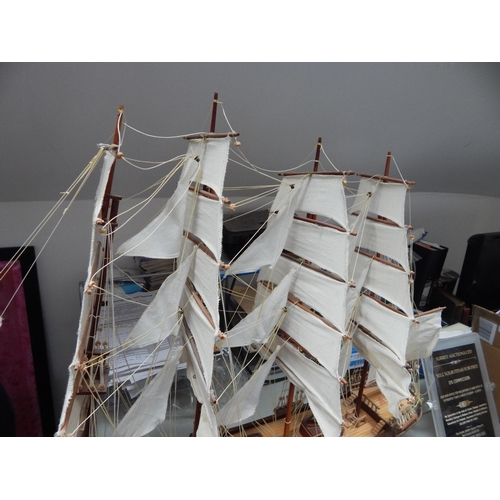 599 - Wooden Model of a Three Masted Galleon: Reputably from Admiralty House. Measuring 95cm wide x 66cm h... 