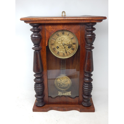 611 - Dutch Art Nouveau Wooden Cased Wall Clock. The Brass Dial Centred with Sinuous Flowers & The Pendulu... 