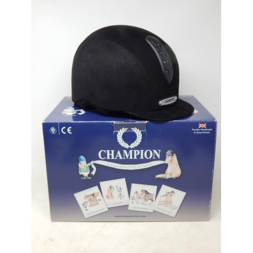 683 - New Champion Junior X-Air Plus Riding Helmet, Navy Size 7. In original Box with tags