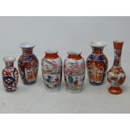 Two Pairs of Oriental Vases together with two further vases.