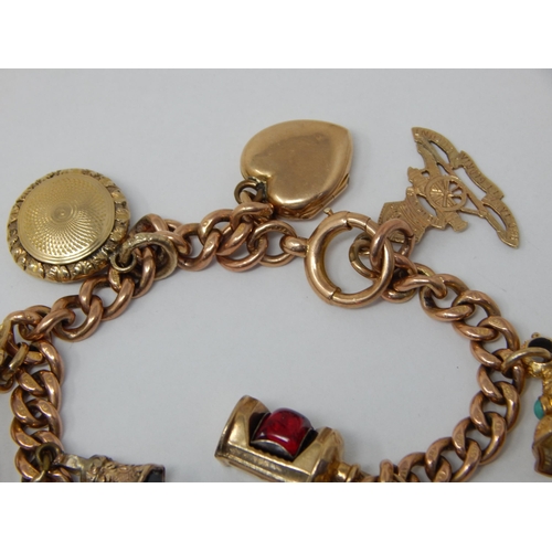 340 - 9ct Yellow Gold Charm Bracelet with attached charms: Gross weight 36.8g