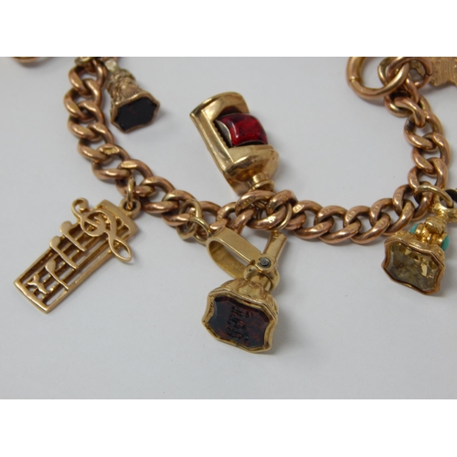 340 - 9ct Yellow Gold Charm Bracelet with attached charms: Gross weight 36.8g