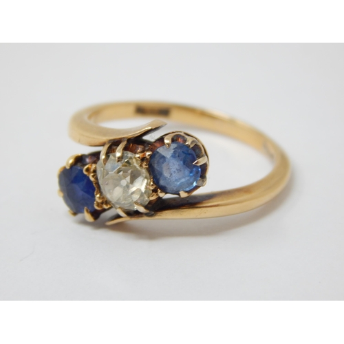 350 - Antique 18ct Yellow Gold Ring Set with a central Diamond Estimated @ 0.60cts Flanked by Two Sapphire... 