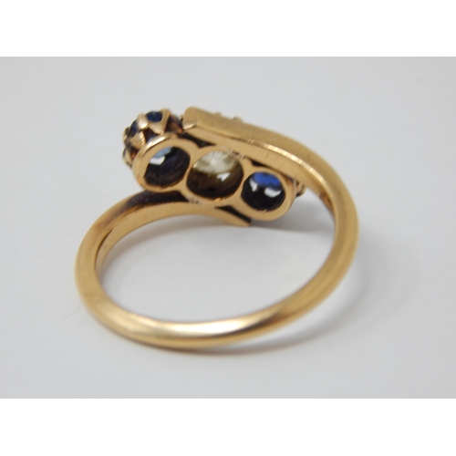 350 - Antique 18ct Yellow Gold Ring Set with a central Diamond Estimated @ 0.60cts Flanked by Two Sapphire... 