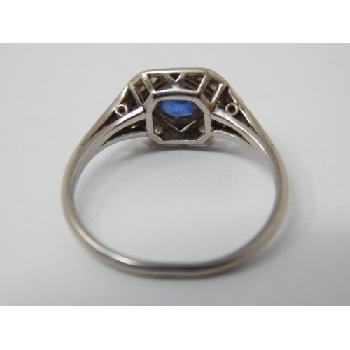 353 - Art Deco Platinum Ring Set with a Good Central Sapphire within a Diamond Border with Diamond Shoulde... 