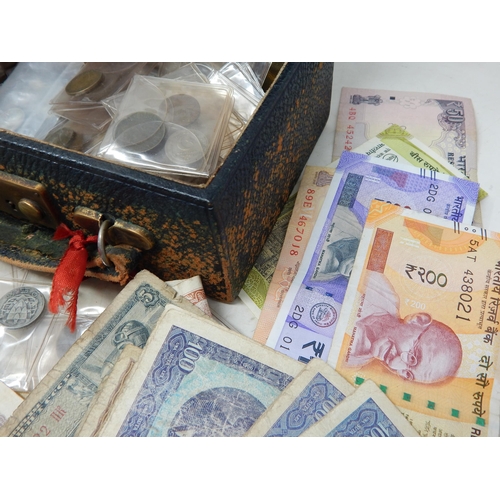 60 - Vintage box containing a large selection of World coins and banknotes (lot)