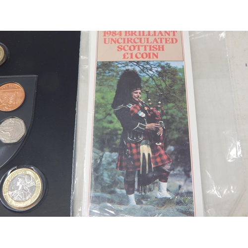 27 - The 2015 Definitive coin album in Royal Mint folder; Hong Kong 1988 Brilliant Uncirculated coin coll... 