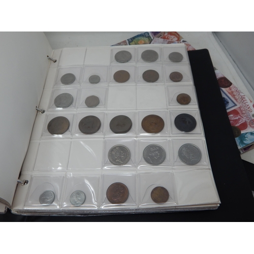 3 - Large collection of World coins and banknotes, some Silver,  housed in 3 x collectors albums