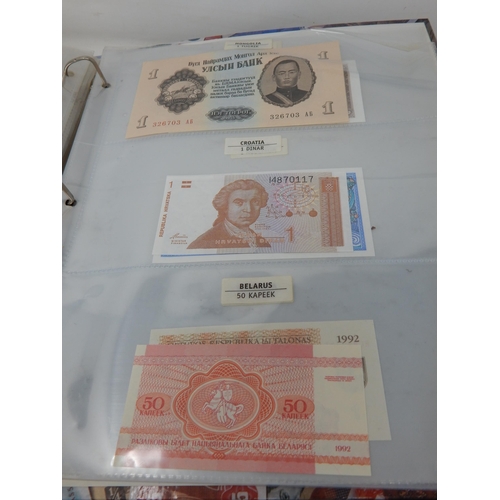 3 - Large collection of World coins and banknotes, some Silver,  housed in 3 x collectors albums