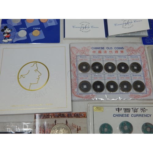 25 - Walt Disney Commemorative Medal 1996, UK Brilliant Uncirculated £2 coin 1997; set of Chinese currenc... 