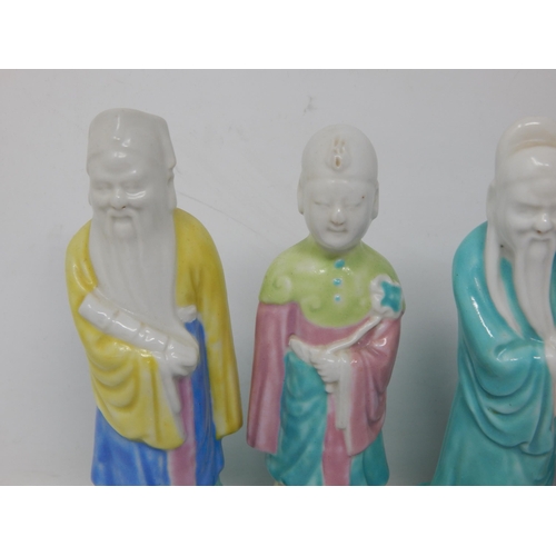 678 - Set of Six C19th Chinese Figures of Immortals in Bright Coloured Glazes with Blanc de Chine Heads: E... 