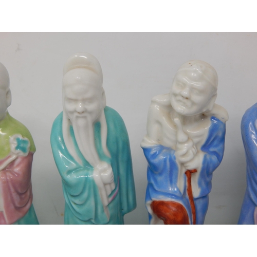 678 - Set of Six C19th Chinese Figures of Immortals in Bright Coloured Glazes with Blanc de Chine Heads: E... 