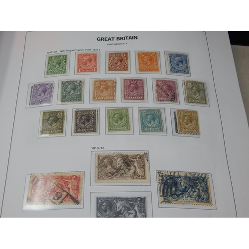 209 - STANLEY GIBBONS: 4 x Albums of Stamps of Great Britain with Outer Sleeves Containing a Massive Colle... 