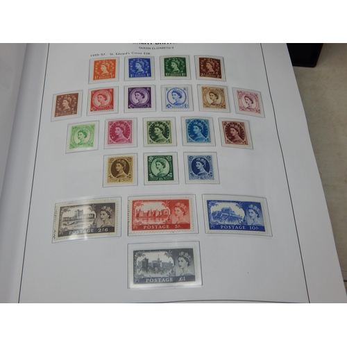 209 - STANLEY GIBBONS: 4 x Albums of Stamps of Great Britain with Outer Sleeves Containing a Massive Colle... 