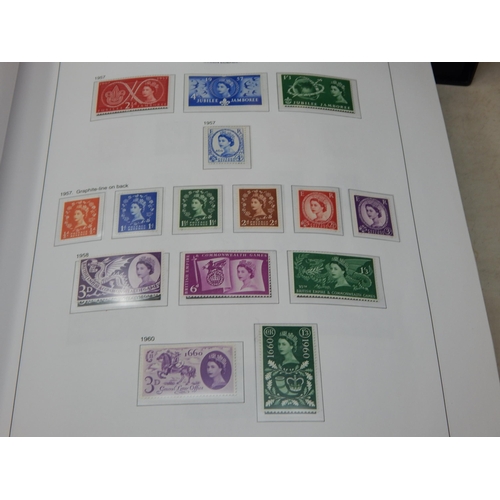 209 - STANLEY GIBBONS: 4 x Albums of Stamps of Great Britain with Outer Sleeves Containing a Massive Colle... 