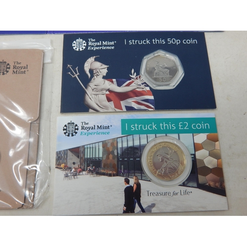 106 - The Peter Pan 2019 50 Pence collection in folder; The Royal Mint Experience I Struck this £2 coin; I... 