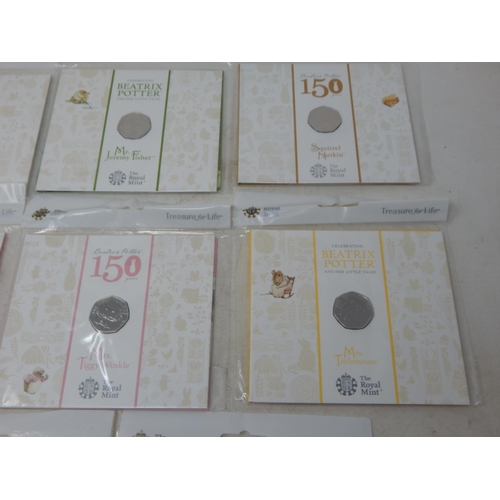 109 - Beatrix Potter - a collection of 8 x various 50p Coins all different and about as struck and housed ... 