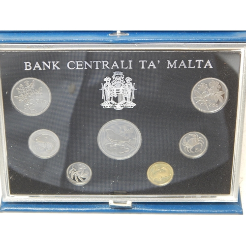 26 - Malta Proof set 1986; Guernsey Proof sets 1985, 1986, 1987 all housed in Royal Mint cases of issue m... 