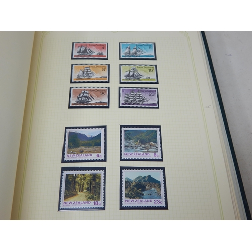 102 - A huge collection of Mint Stamps housed in 2 x vintage green Stanley Gibbons albums comprising: Asce... 