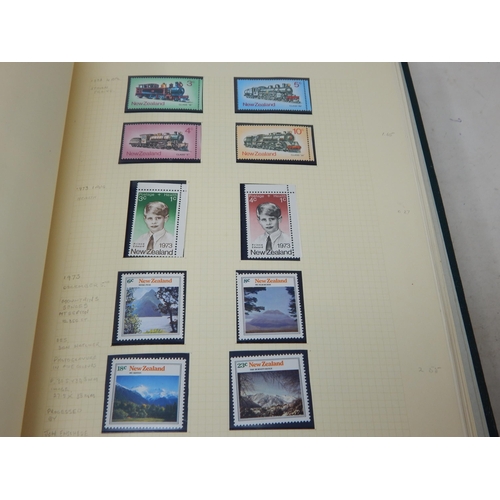 102 - A huge collection of Mint Stamps housed in 2 x vintage green Stanley Gibbons albums comprising: Asce... 