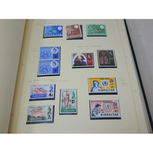 102 - A huge collection of Mint Stamps housed in 2 x vintage green Stanley Gibbons albums comprising: Asce... 