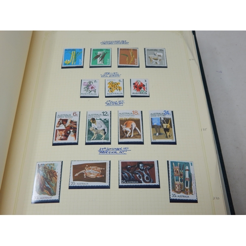 102 - A huge collection of Mint Stamps housed in 2 x vintage green Stanley Gibbons albums comprising: Asce... 