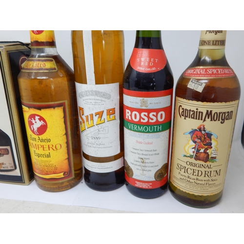 954 - 6 Bottles of Oyzo, Commadaria, Ron Anejo Pampero, Suze, Vermouth & Captain Morgans Rum.