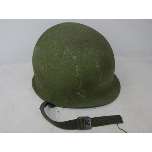 587 - American M1 Helmet with Camo Cover.