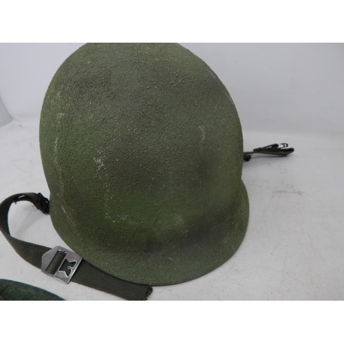 587 - American M1 Helmet with Camo Cover.