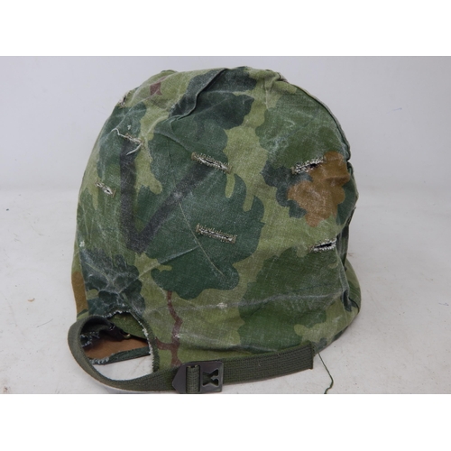 587 - American M1 Helmet with Camo Cover.