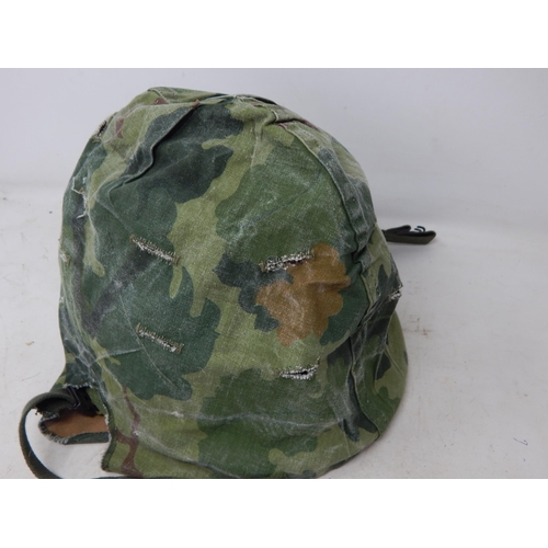 587 - American M1 Helmet with Camo Cover.