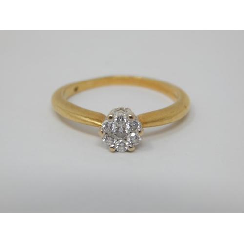 252 - 18ct Yellow Gold Diamond Flowerhead Ring Set with Seven Diamonds. The Diamonds estimated @ 0.50cts. ... 