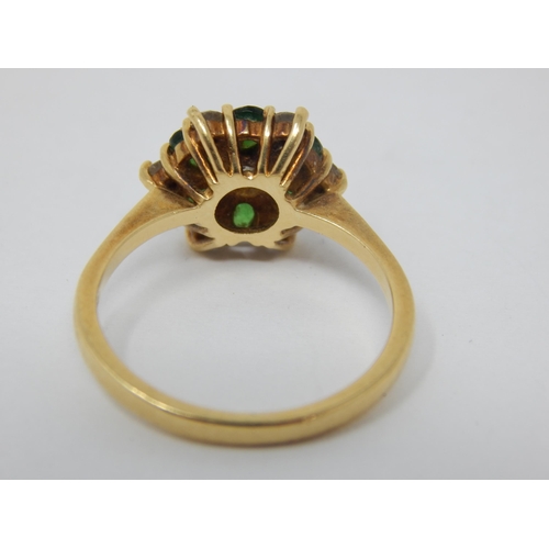 254 - 18ct Yellow Gold Flowerhead Ring Set with a Central Diamond within an Emerald & Diamond Border. Ring... 