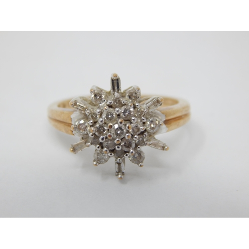 259 - 9ct Yellow Gold Diamond Flowerhead Ring Set with Brilliant Cut & Baguette Cut Diamonds estimated @ 0... 