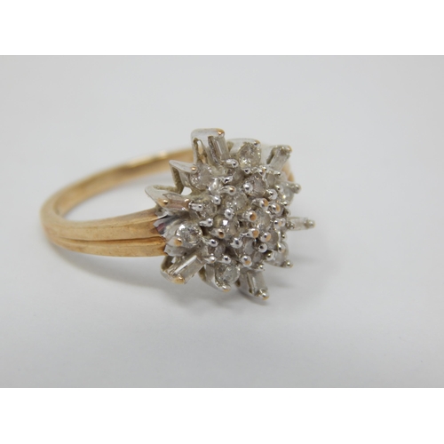 259 - 9ct Yellow Gold Diamond Flowerhead Ring Set with Brilliant Cut & Baguette Cut Diamonds estimated @ 0... 