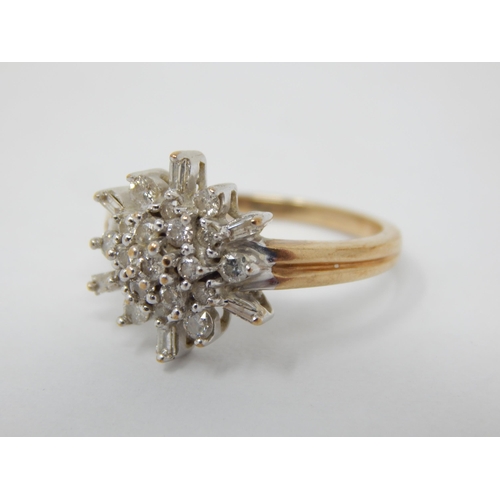 259 - 9ct Yellow Gold Diamond Flowerhead Ring Set with Brilliant Cut & Baguette Cut Diamonds estimated @ 0... 