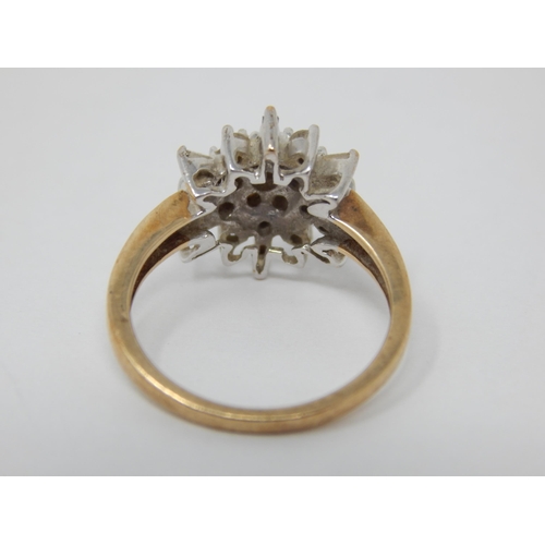 259 - 9ct Yellow Gold Diamond Flowerhead Ring Set with Brilliant Cut & Baguette Cut Diamonds estimated @ 0... 