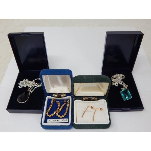 297 - 2 x Pairs of 9ct Yellow Gold Earrings together with two silver pendants & chains.