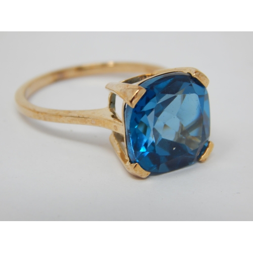 275 - 9ct Yellow Gold Ring Set with a Marambaia London Blue Topaz 9.17cts: Ring Size P/Q