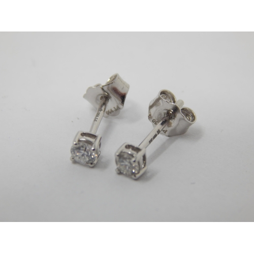 277 - A Pair of Diamond Earrings Set in Platinum: G-H: SI 1-2