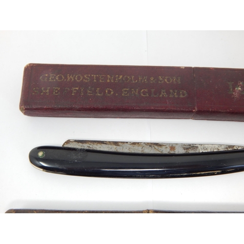 160 - Vintage Geo. Wostenholm & Son straight razor; twinned with another vintage razor both in their origi... 