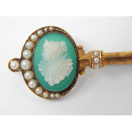 143 - A Victorian Yellow Metal Key Brooch with Inset Cameo & Seed Pearls.