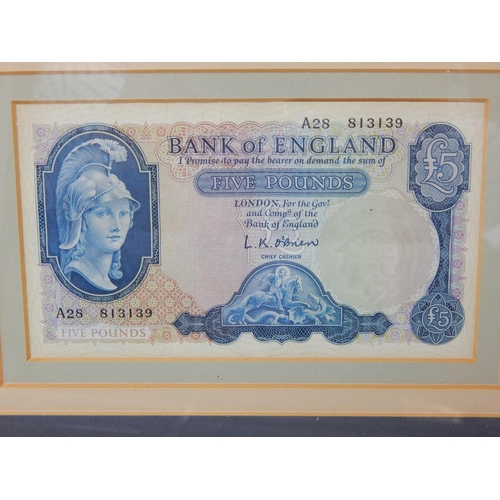 194 - L K O'Brien Blue Five Pound note in display case; Russian 500 Rouble Note and Hong Kong bank note in... 