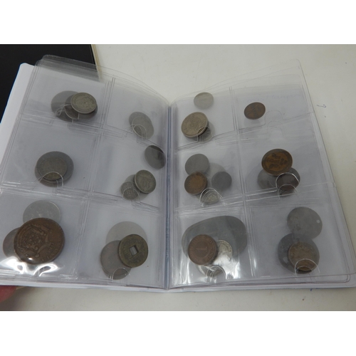 128 - A large collection of coins housed in 4 collectors albums